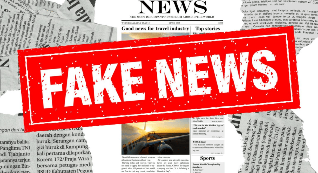 A collage of newspaper scraps with the words "fake news" printed on the center in red